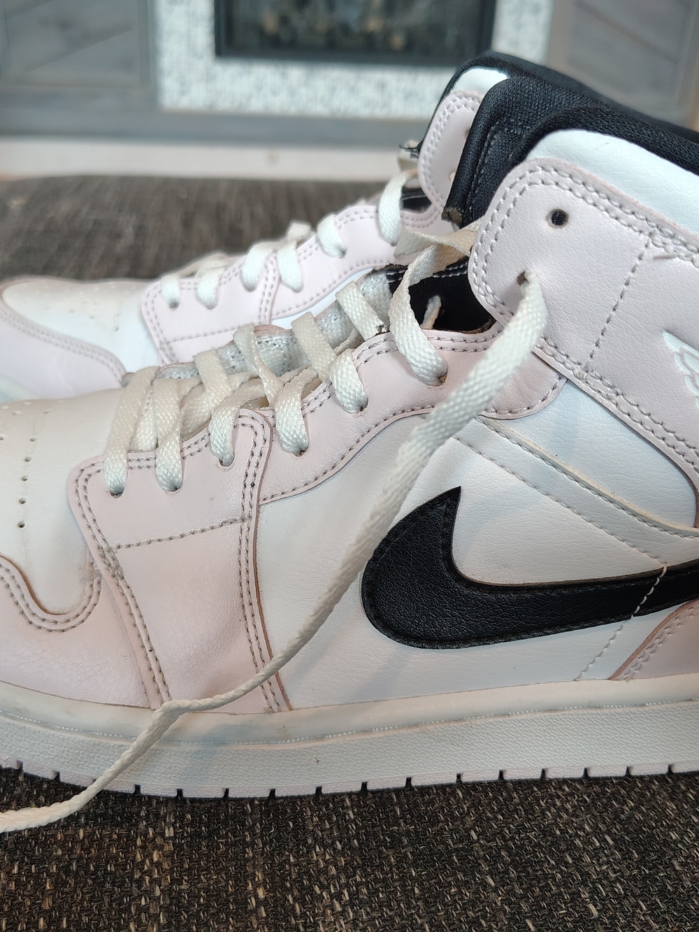 Nike Womens AIR JORDAN 1 MID Barely Rose Sneakers in White/Pink/Black Side 10.5